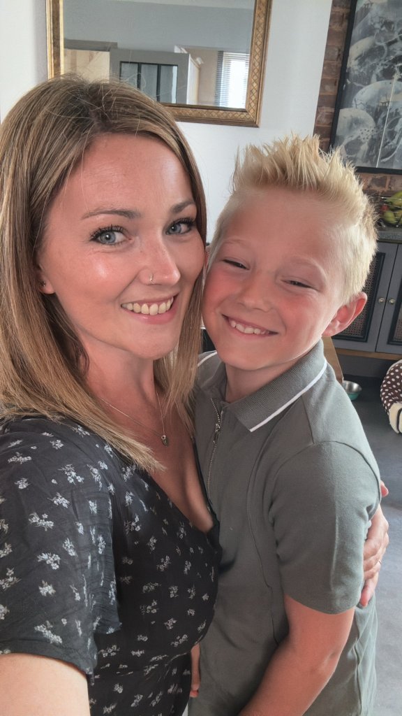 Jay Whitfield, 37, and her seven-year-old son taking a selfie together